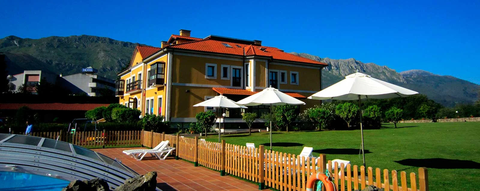 Hotel and gardens with the Sierra del Cuera in the background