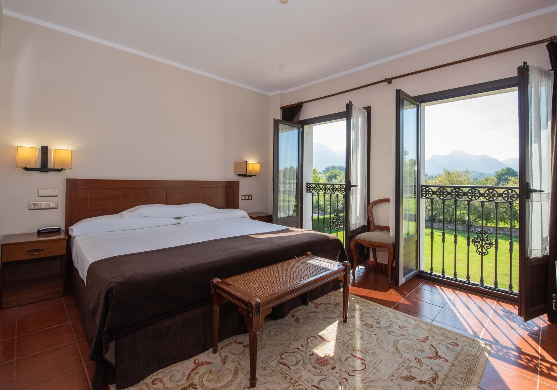 Double room opening onto a hotel balcony